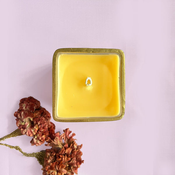 ReStory Scented Candle in a mini square glass jar
